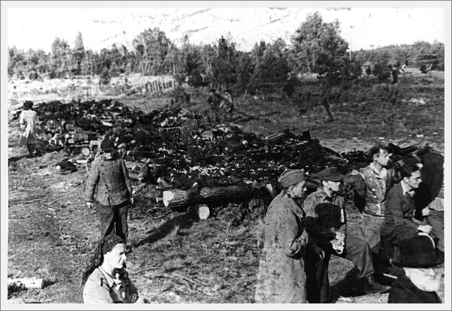 Klooga, Estonia, Survivors beside burnt bodies, September 1944
